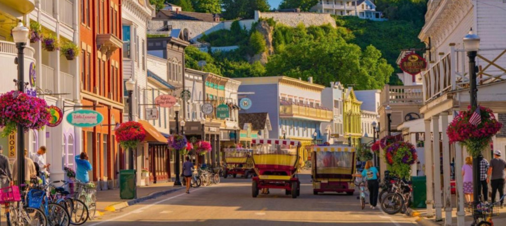 Mackinac Island offers timeless charm with its horse-drawn carriages, historic architecture and attractions. AN ideal town to  experience this Labor Day Weekend